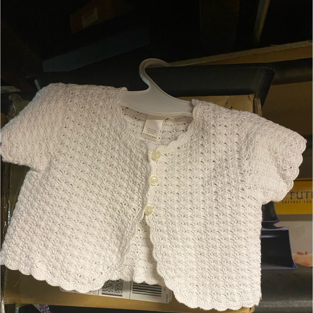 Baby girls knitted sweater/vest white.